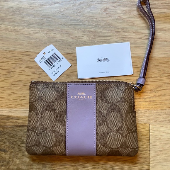 Coach Handbags - NWT Coach signature canvas wristlet